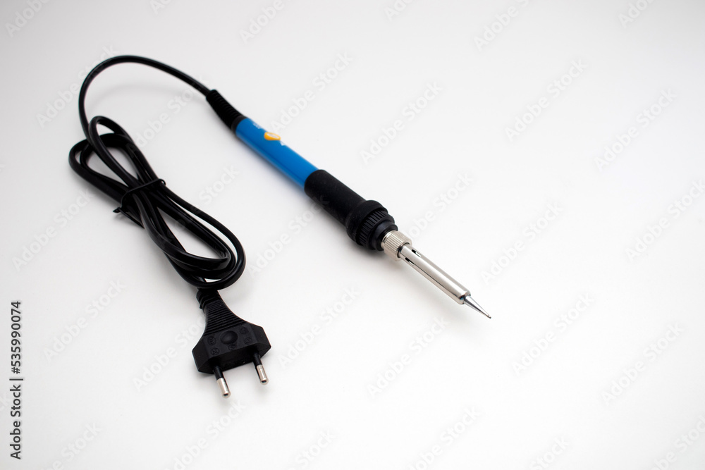 Electric Soldering Iron on a white background Electric Soldering Iron on a white background
