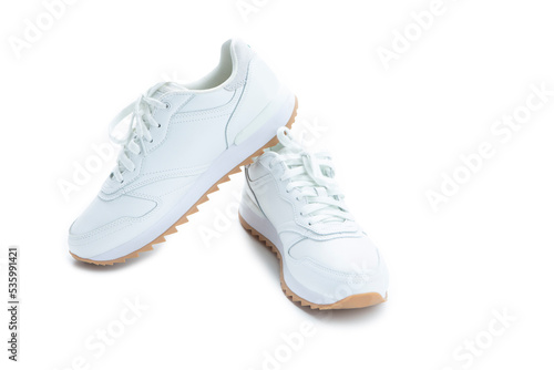 Pair of Good New Professional White Sneakers Over White Background On One Another