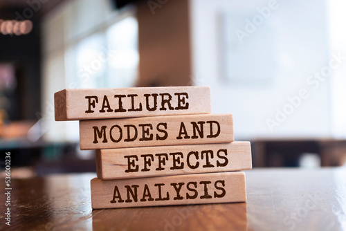 Wooden blocks with words 'Failure Modes and Effects Analysis'. -FMEA photo