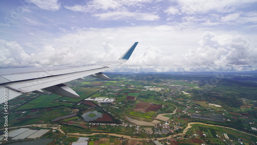 South East Asia, window plane view, plane wing, rice fields