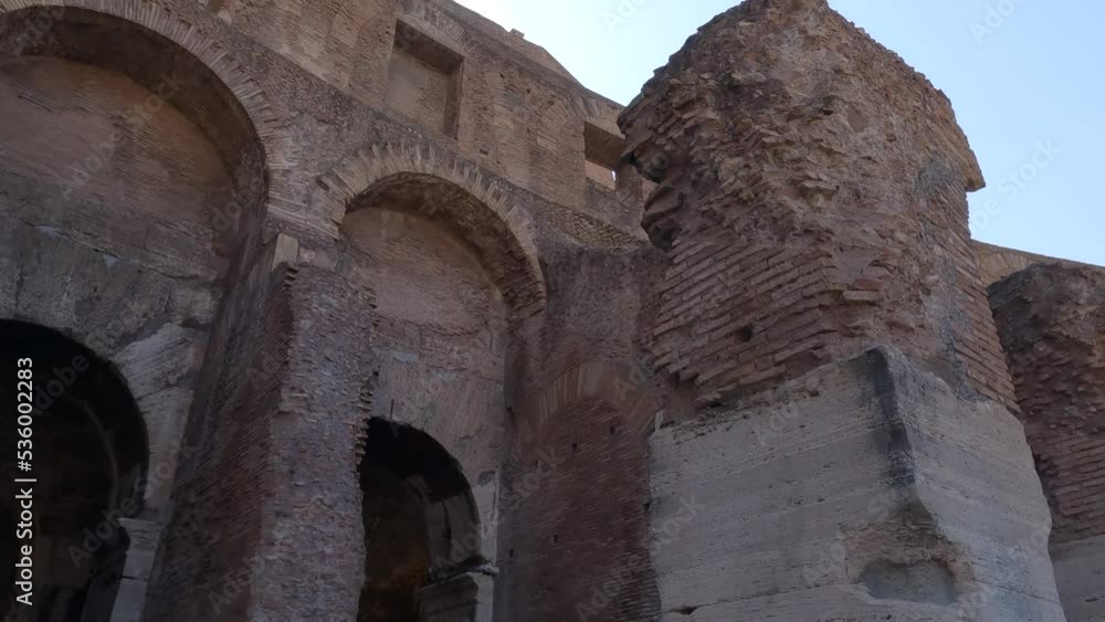 Looking Up At Brickwork And Masonry On Outside Wall And Arch Of The Colosseum In Rome
Looking Up At Brickwork And Masonry On Outside Wall And Arch Of The Colosseum In Rome