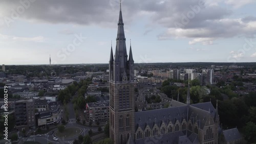 Aerial view around the Saint Vitus Church, in Hilversum, Netherlands - orbit, drone shot photo