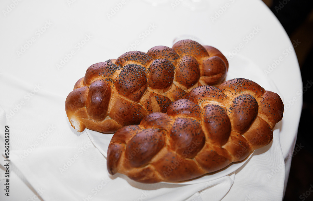 two loaves of bread in the shape of a kalacha two loaves of bread in the shape of a kalacha