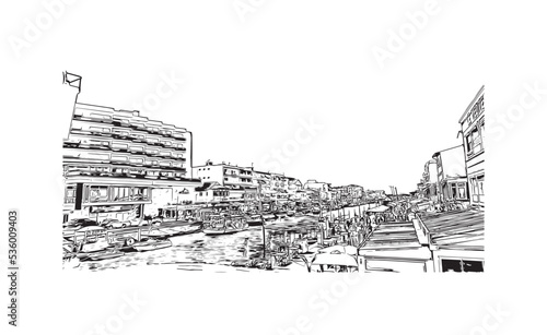 Building view with landmark of Palavas les Flots is the 
commune in France. Hand drawn sketch illustration in vector.