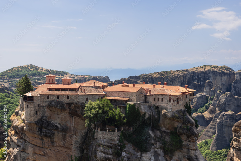 On tiny free areas of Varlaam Monastery rocky plateau, monks created elegant and contemplative mini gardens between dense constructions and diligently look after them now, Meteora, Greece