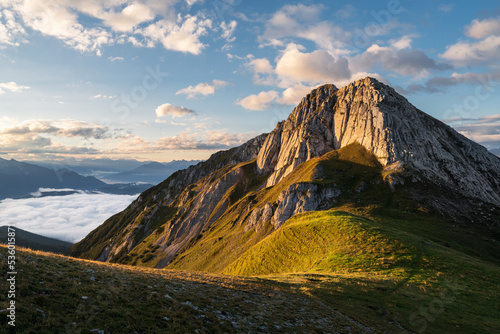 Panorama view of hiking path to mountain Predigstein in Austria Tyrol. Beautiful morning sunlight.