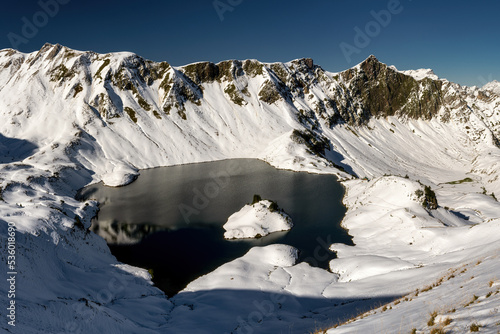 Panorama view of first snow at lake schrecksee near Bad Hindelang, Hinterstein in ther german alps.  photo