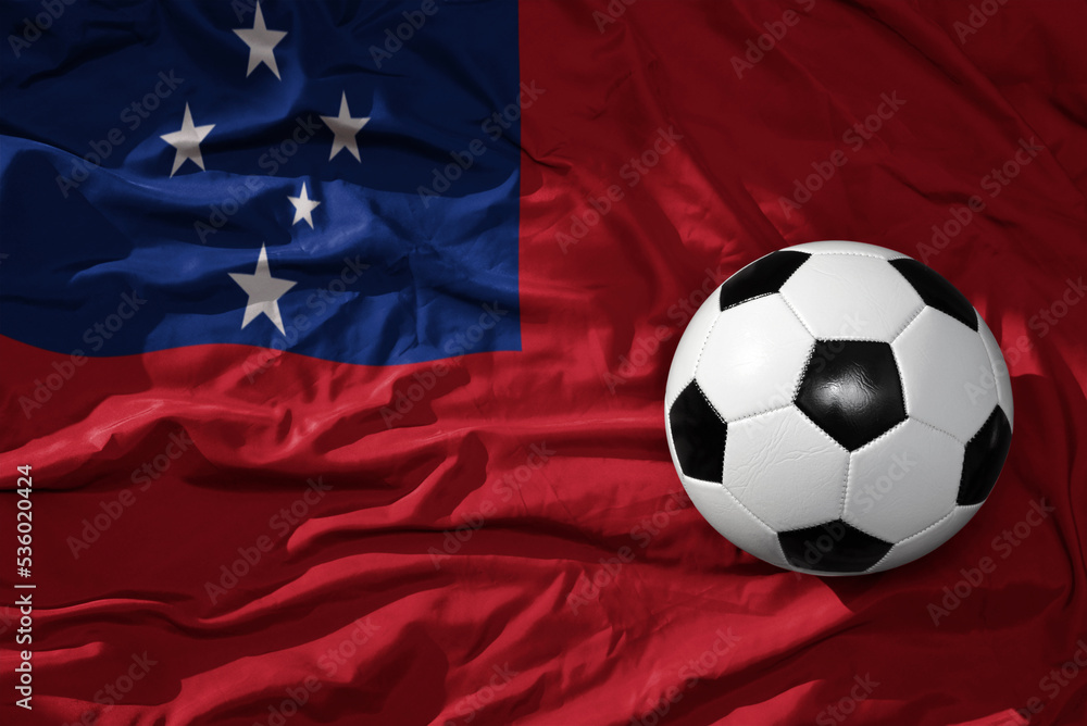 Fototapeta premium vintage football ball on the waveing national flag of Samoa background. 3D illustration