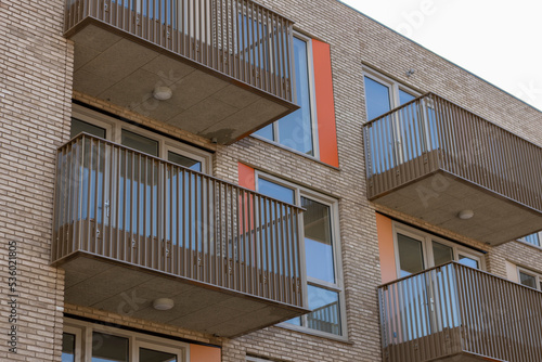 Balcony in final construction phase showing exterior facade of real estate investment project. Dutch engineering real estate investment urban development © Maarten Zeehandelaar