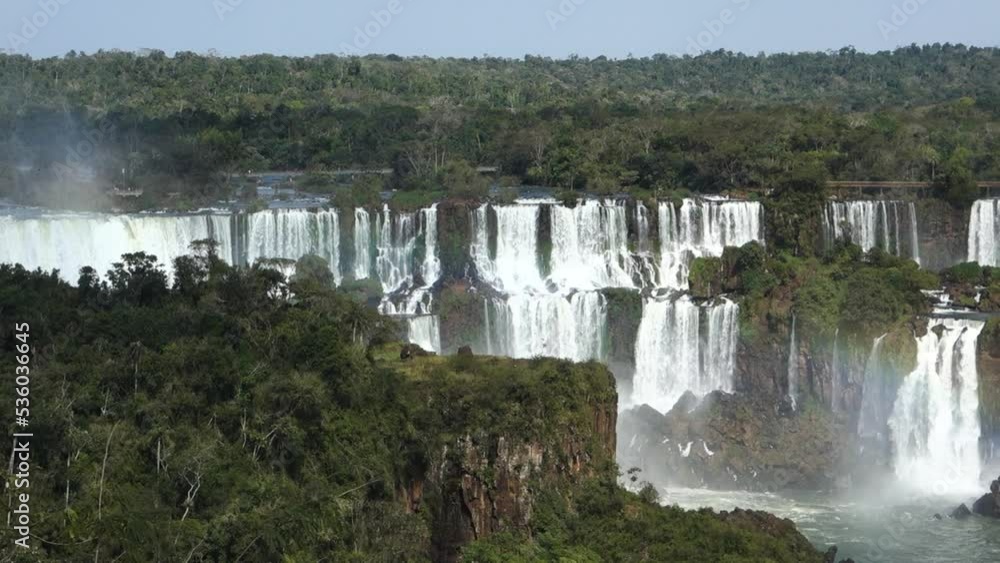 Iguazu Falls With A Large Waterfall On The Border Between Argentina And Brazil. Panning Shot