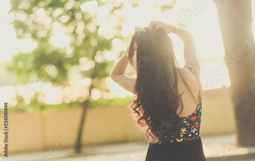 woman from behind and side