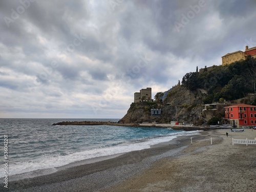 Seacoast of Cinque Terre with its villages and nature in Italy during a gloomy day of spring