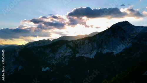 Wallpaper Mural moving drone footage filmed up the Slovenian mountains in the Alps filmed in 4k wide lens, showing beautiful mountains, nature, and sky at sunset Torontodigital.ca