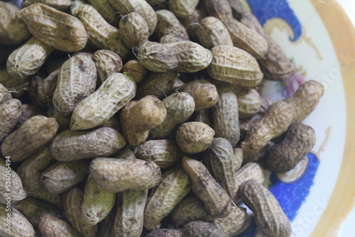 lots of boiled peanuts on the plate photo