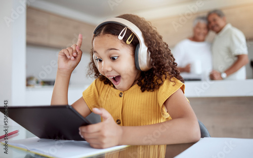 Photos Excited, homeschool tablet or girl with ideas, learning motivation or education innovation in homework study on headphones