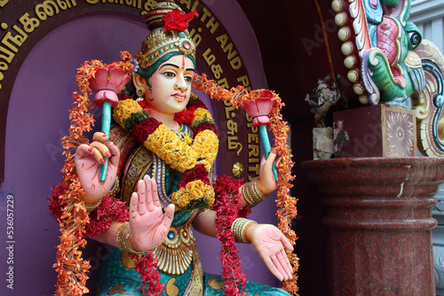 statue of a divinity in an hindu temple (sri senpaga vinayagar)  in singapore  photo