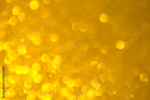 Gold Christmas background with snowflakes 