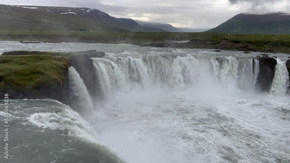 Goðafoss waterfall in northern Iceland, located along the country's main ring road. The water of the river Skjálfandafljót falls from a height of 12 metres over a width of 30 metres. Goðafoss waterfall in northern Iceland, located along the country's main ring road. The water of the river Skjálfandafljót falls from a height of 12 metres over a width of 30 metres.