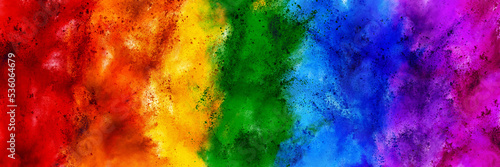colorful rainbow holi paint color powder explosion wide panorama banner background. peace rgb beautiful party concept