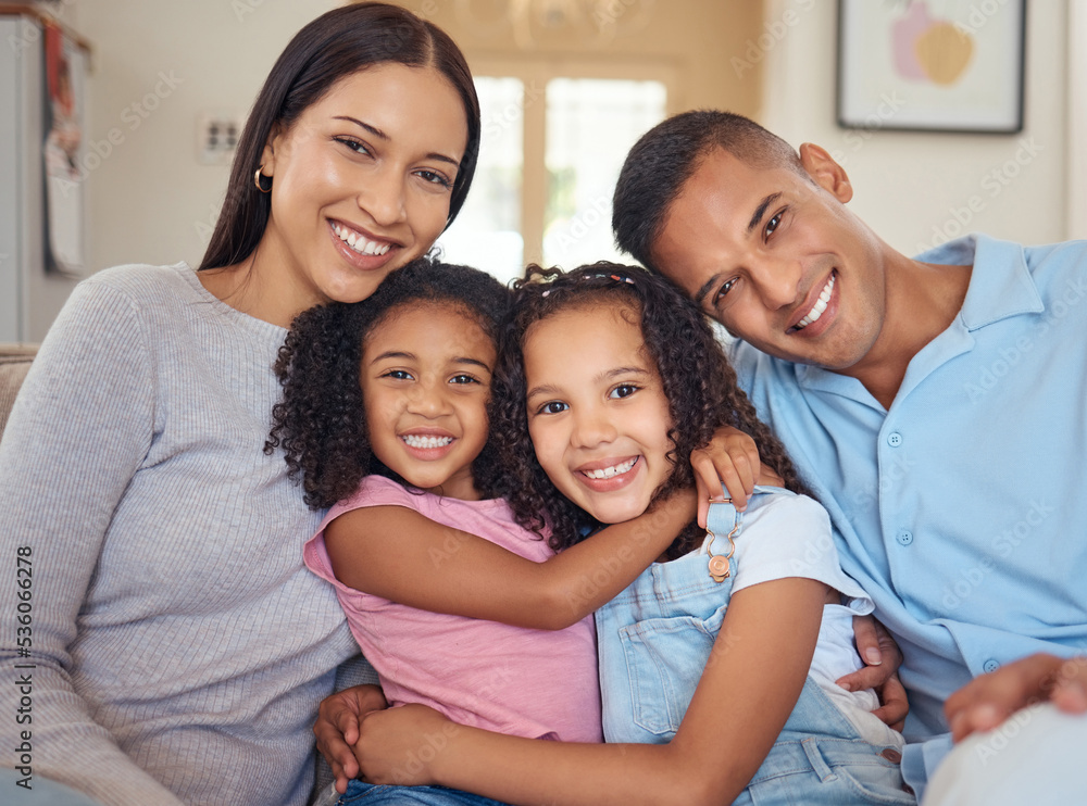 Portrait, happy family and living room sofa hug, smile and bonding for love, happiness and joy together at home. Parents of mother, father and girl children or kids on lounge couch smiling at house