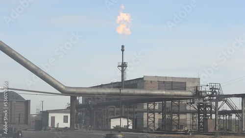 Industrial plant with smoke photo