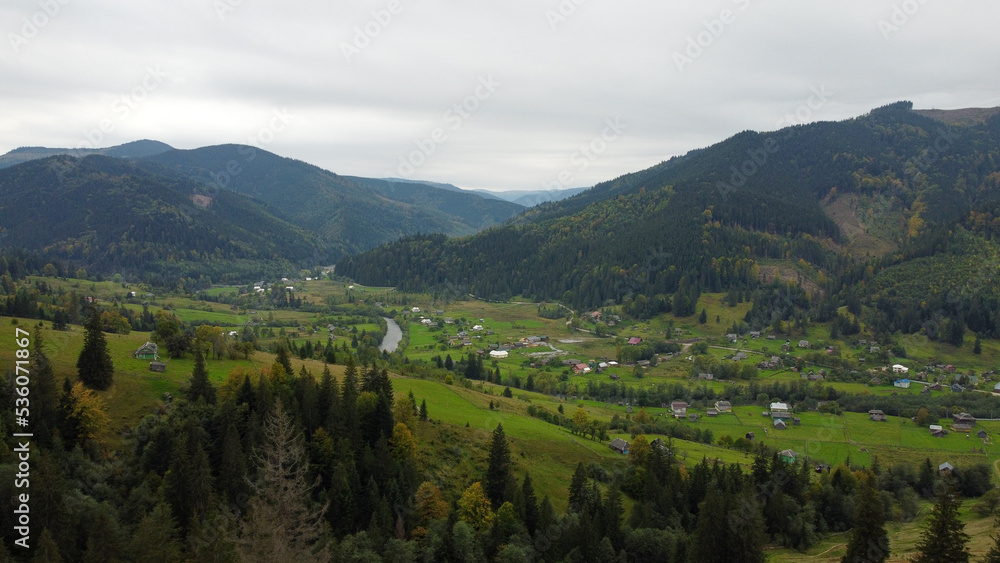 Panorama of the beautiful mountains. Village in the valley.