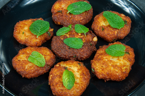 Indian potato dumpling on table photo