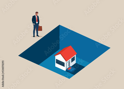 Home prices fell in the real estate market crash. Businessman watching a house sunk in the gap. Flat vector illustration.
