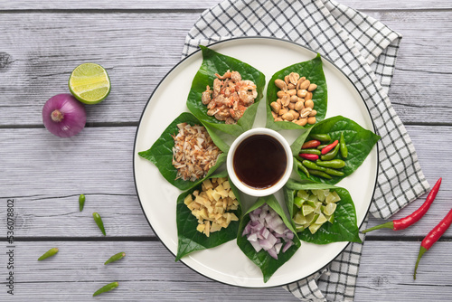 Miang kham - A royal leaf wrap appetize photo