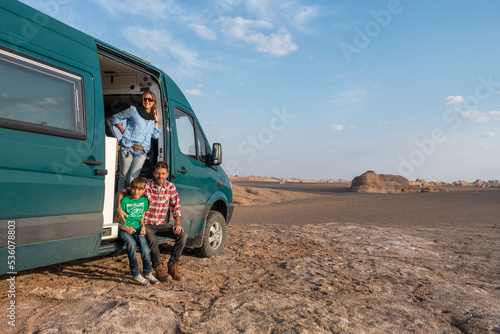 Family get fun in the desert on their camper van 4x4
