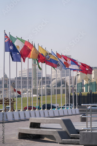 Flags of nations qualified for World Cup 2022 Qatar at Doha Corniche, Qatar. photo