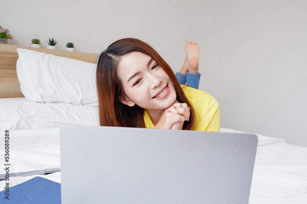 Young woman using laptop for online meeting. Young woman using laptop for online meeting.