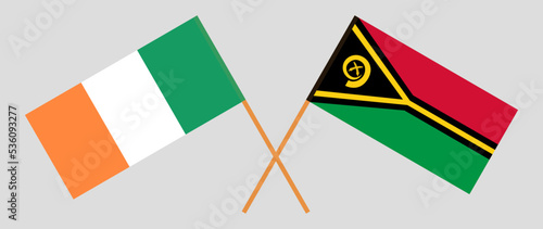 Crossed flags of Ireland and Vanuatu. Official colors. Correct proportion