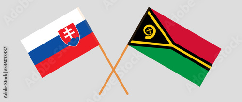 Crossed flags of Slovakia and Vanuatu. Official colors. Correct proportion