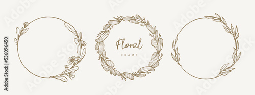 Hand drawn circle floral frame with flowers, branches and leaves. Wreath. Elegant logo template. Vector illustration for labels, branding business identity, wedding invitation