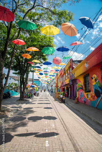 Pereira, Risaralda, Colombia. February 3, 2022: The famous meeting street in the city decorated with colored umbrellas.