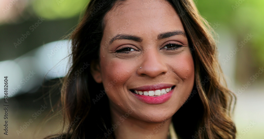 Ethnically diverse happy young woman smiling portrait Ethnically diverse happy young woman smiling portrait