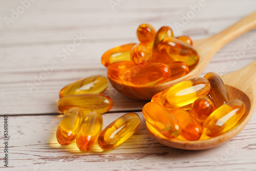 Fish oil or Cod liver oil gel in capsules with omega 3 vitamins, supplementary healthy food