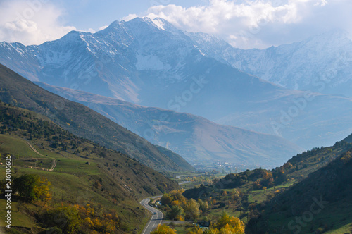 Autumn landscape in the mountains. Yellowed trees in autumn in the mountains of North Ossetia. Mountain gorges. View of the mountain peaks. Nature in the mountains. © Eduard Belkin