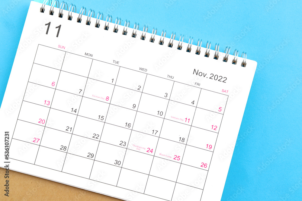calendar november 2022 top view on a blue background calendar november 2022 top view on a blue background