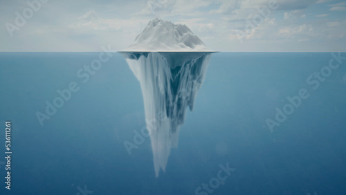 Iceberg in clear blue water and danger hidden underwater. Iceberg. Hidden danger and global warming concept. Floating ice in the ocean. Copyspace for text or design.