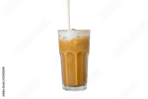 pouring milk into Iced coffee on glass isolated white background, summer drink concept