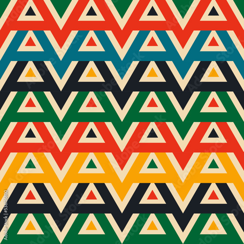 Retro groovy aesthetic pattern with triangles in the style of the 70s and 60s. Vector illustration