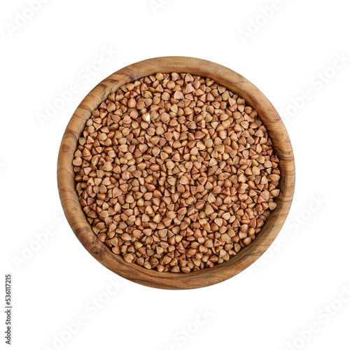 Raw  buckwheat in wooden bowl