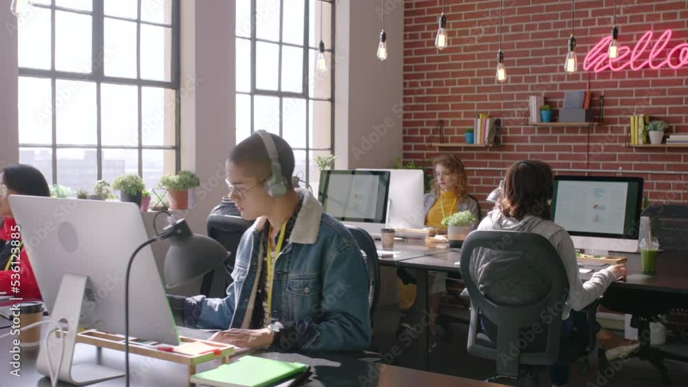 Graphic designer people, computer studio and creative startup business workspace with gen z office, online productivity. Information technology, website design or digital marketing company staff