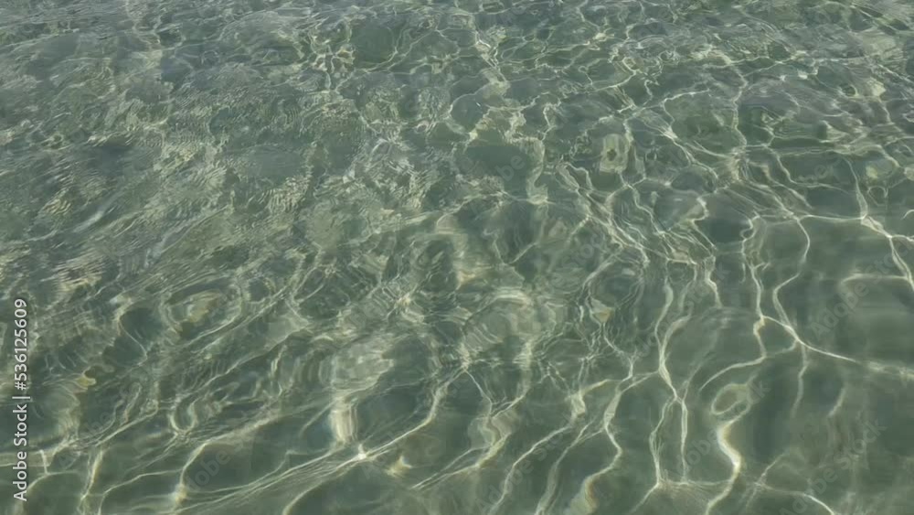 Sun shimming on water surface at beach Sun shimming on water surface at beach