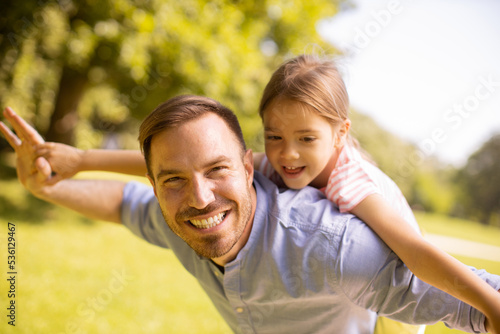 Father with daughter having fun at the park