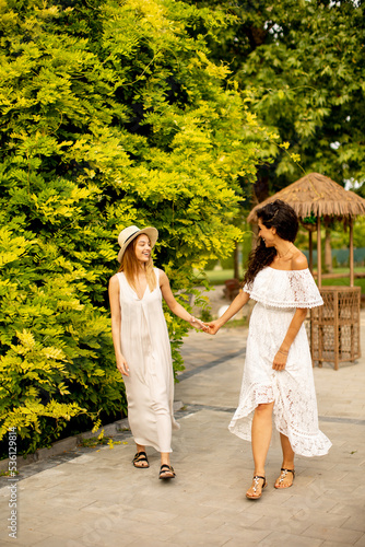 Pretty young women walking ...