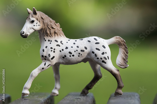 Russia. Kuzbass. A children s toy in the form of a horse of the Knabstrup breed. This is a Danish horse breed with an unusual white coat color with a variety of shades and variations of dark spots.