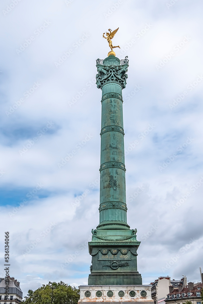 Fragments of July Column (Colonne de Juillet, 1840) with Genie de La Liberty at top on Place de la Bastille. Paris, France.